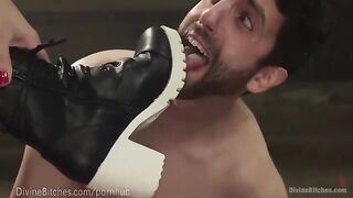 The muscled dominatrix is dominating her slaveboy in the hottest way ever