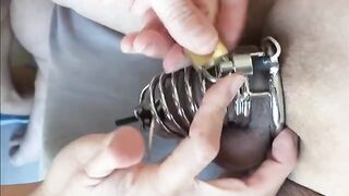 Femdom milking with chastity and e-stim for a huge load