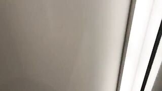 A girl is having fun with a young man in the fitting room