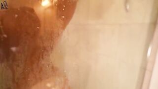 Young beautiful girl plays with a big dildo in the shower