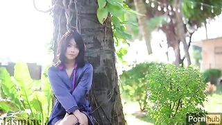 The Asian girl has sex in the garden and squirts pee