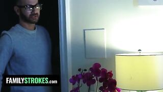 The stepdaughter, in sexy pink lingerie, pleasures her stepdad while her stepmom is in the room