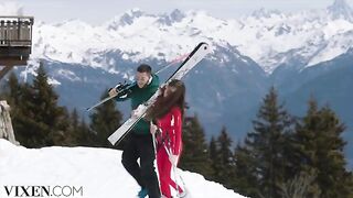A young girl is having fun with a guy in the ski resort