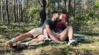 Public amateur couple have sex on a picnic in the park, captured raw and real