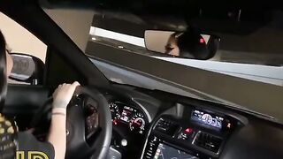 Slutty chick caresses a big cock in the car and makes him cum