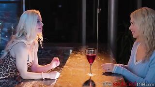 The girl is being served a erotic cocktail by the bartender