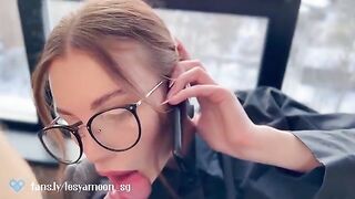A hot slut has sex with her friend while talking on the phone with her husband