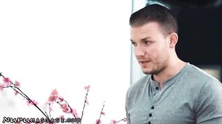 Two masseuses for one customer in a steamy Nuru Massage scene