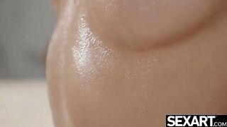 Beautiful girl relaxes with a sensual oil massage