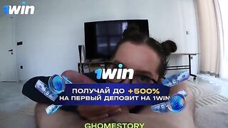 A tattooed girl with glasses is sucking the dick of her boyfriend