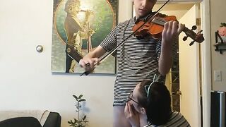 The couple was trying to practice violin but couldn’t
