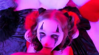 The man with a mask of a clown makes cum on her face