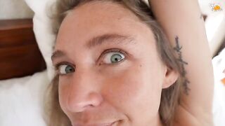 A passionate couple enjoys a sensual afternoon of lovemaking in bed