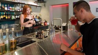 The cute customer went down on the hot bartender's pants
