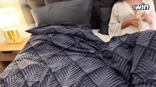 A hot step mom shares a bed with her stepson on a rainy night