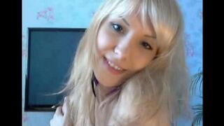 A hot blonde caresses her pussy with her fingers in a steamy session