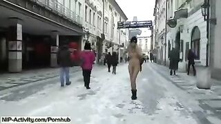 Student is showing her tits and ass on the city streets