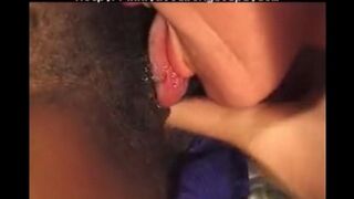 A young black beauty is having fun with an older white guy