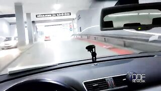 A sweet girl gives a blowjob to a guy while driving in the car