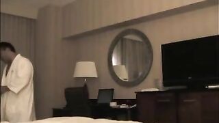 A man brought a whore to the hotel room and started to undress her