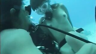 Fella has sex with a girl with a hairy pussy under the water