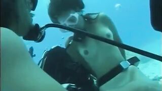 Fella has sex with a girl with a hairy pussy under the water