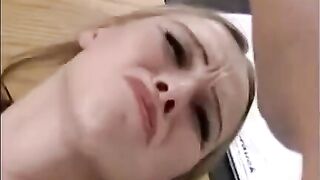 A girl is being fucked by a hand and a dick at once