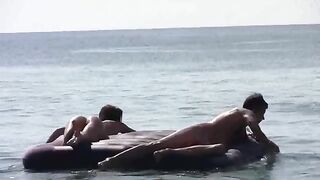 Nude beauties playing on the beach