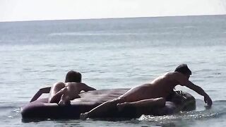 Nude beauties playing on the beach