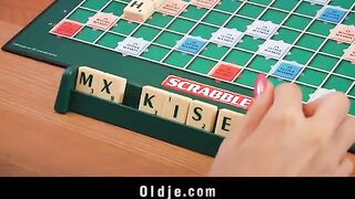 The sexy blonde has fun with a timid old man in the kitchen