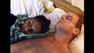 A drunk black girl is being taken by a stranger