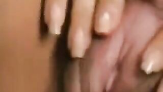 Hairy pussy with a big clit plays with itself