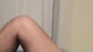 The guy plays with his cock watching gay porn