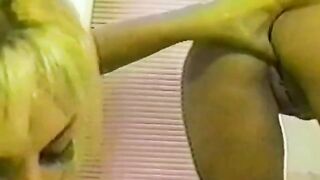 Two hot chicks have fun in the shower, using various toys