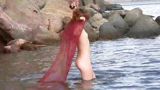 A small breast girl got wet from the rain