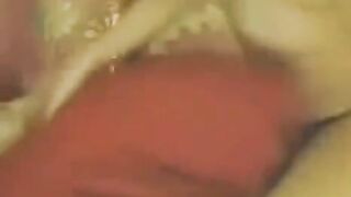 Young Chinese beauty masturbates in front of a webcam
