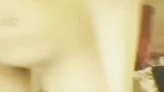 Young Chinese beauty masturbates in front of a webcam