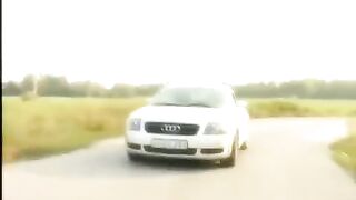 A blonde is caressed on the car hood with her pussy shaved