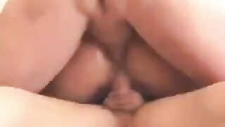 A guy fucks his wife and her girlfriend on the couch