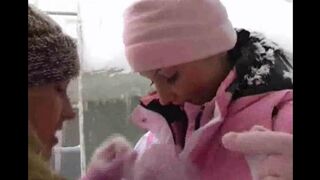 Two lesbians fuck each other in the cold winter weather