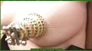 A nice woman has piercings in her labia with needles in this hot video