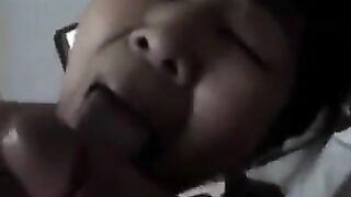 A Chinese woman practices her blowjob skills on him