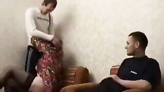 A mature woman fucked by her son's friend in the hotel