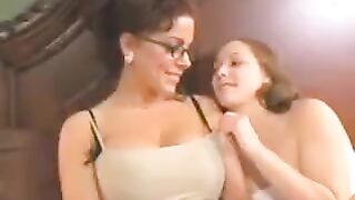 A sweet girl has sex with her beautiful mother using a dildo