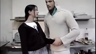 A young guy deprived the naive virgin brunette in the kitchen