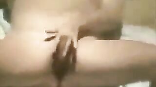A girl was masturbating on the beach and was filmed by a hidden camera