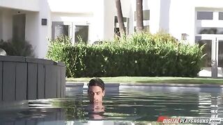 A couple is having fun in the pool and gets very excited
