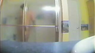 A girl did not know that there was a camera in the bathroom
