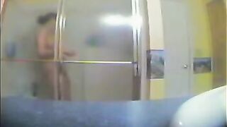 A girl did not know that there was a camera in the bathroom