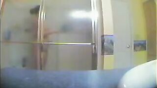A girl did not know that there was a camera in the bathroom